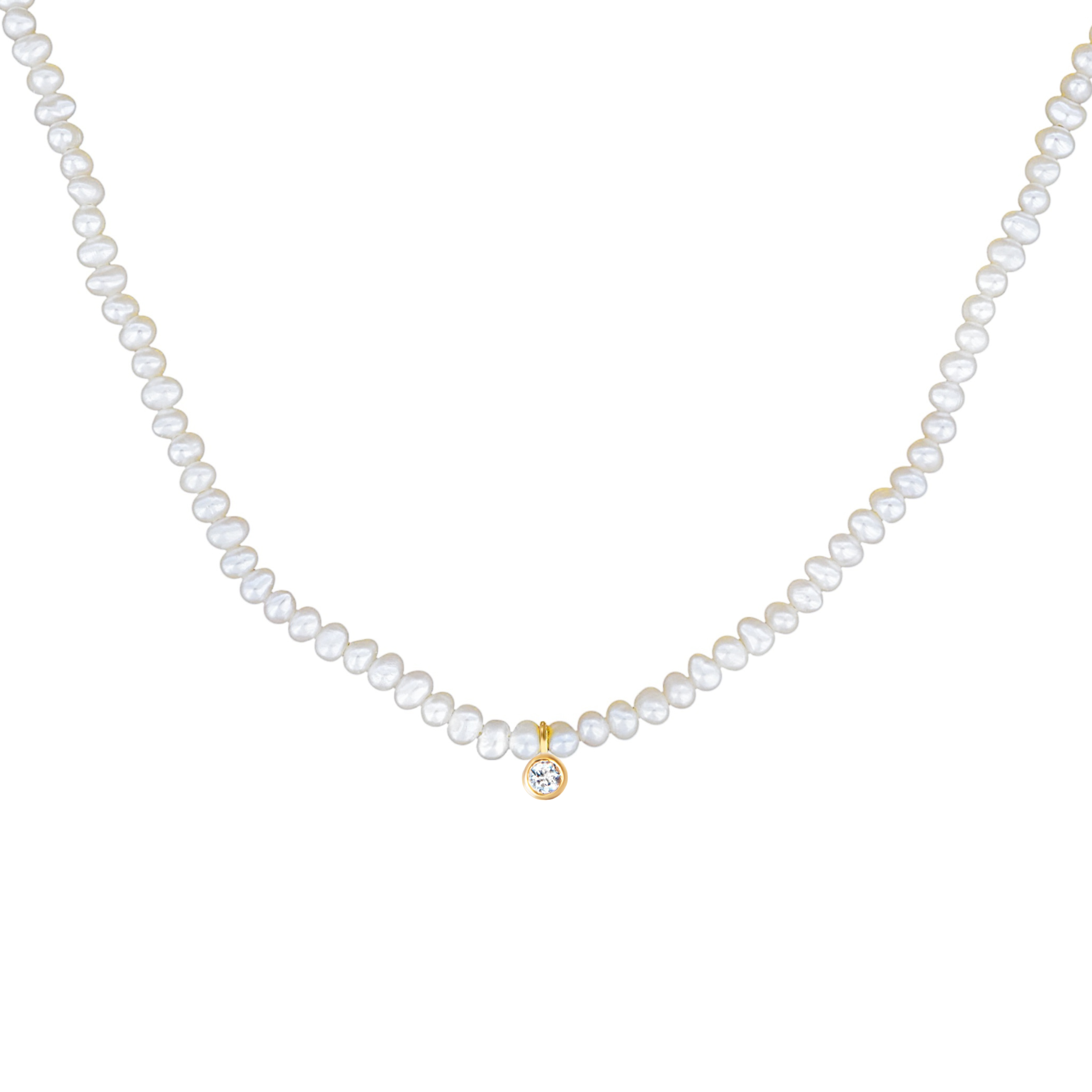 A white freshwater pearl necklace with a small gold pendant featuring a clear round-cut topaz gemstone, displayed against a solid white background.