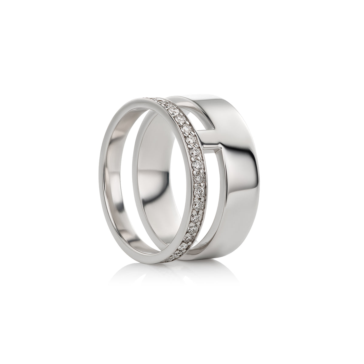 A swhite gold double-band ring with a central channel set with small clear stones, shown on a clean white background.