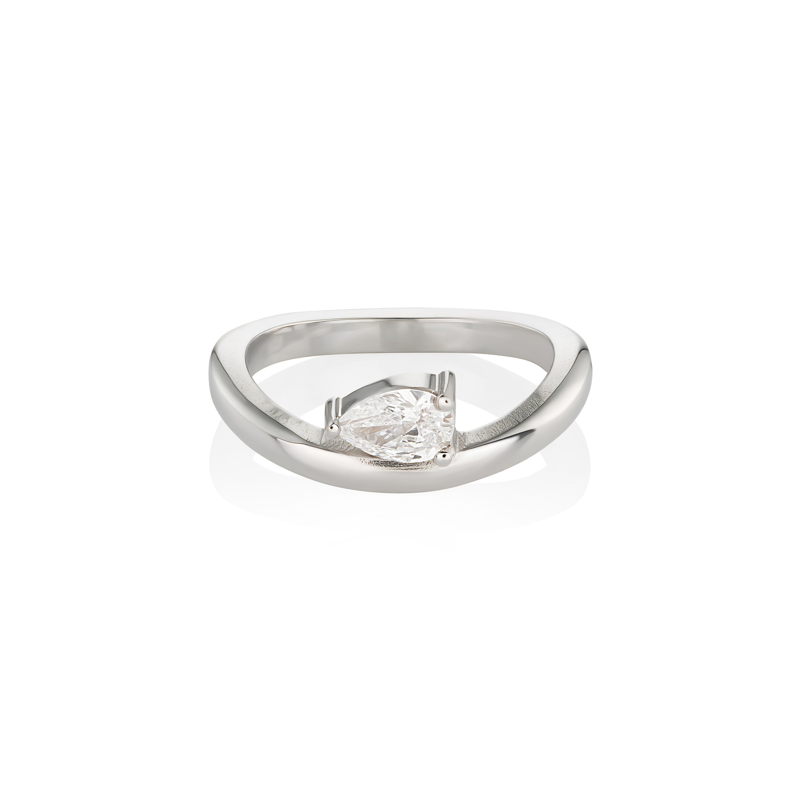 white gold engagement ring with pear-shaped diamond