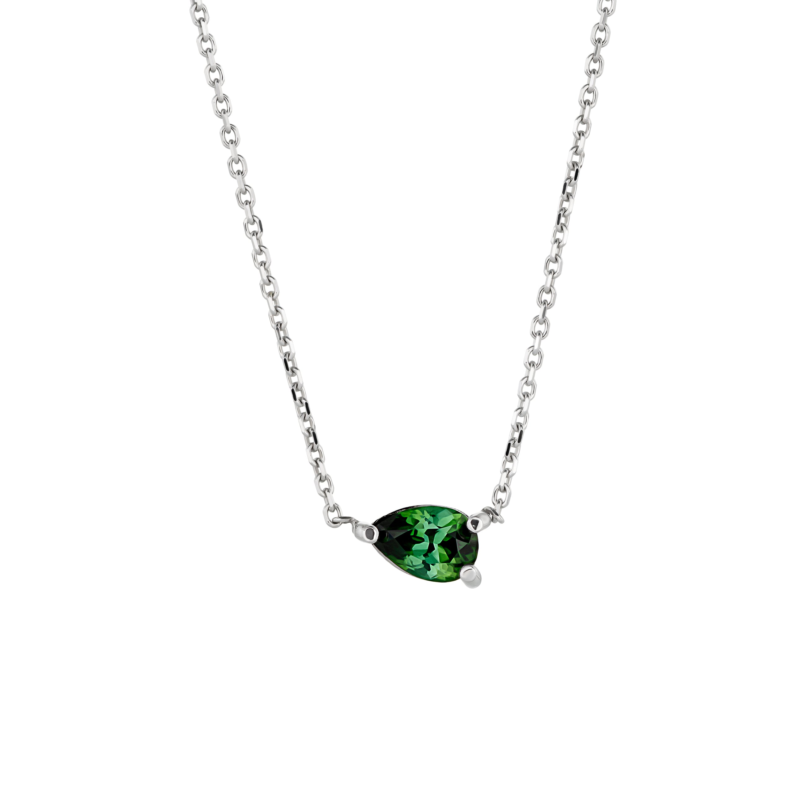 A minimalist and elegant pendant featuring a pear-cut tourmaline set sideways on a delicate white gold chain.