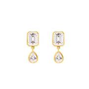 Gold earrings with emerald-cut and teardrop-shaped topaz on a white background