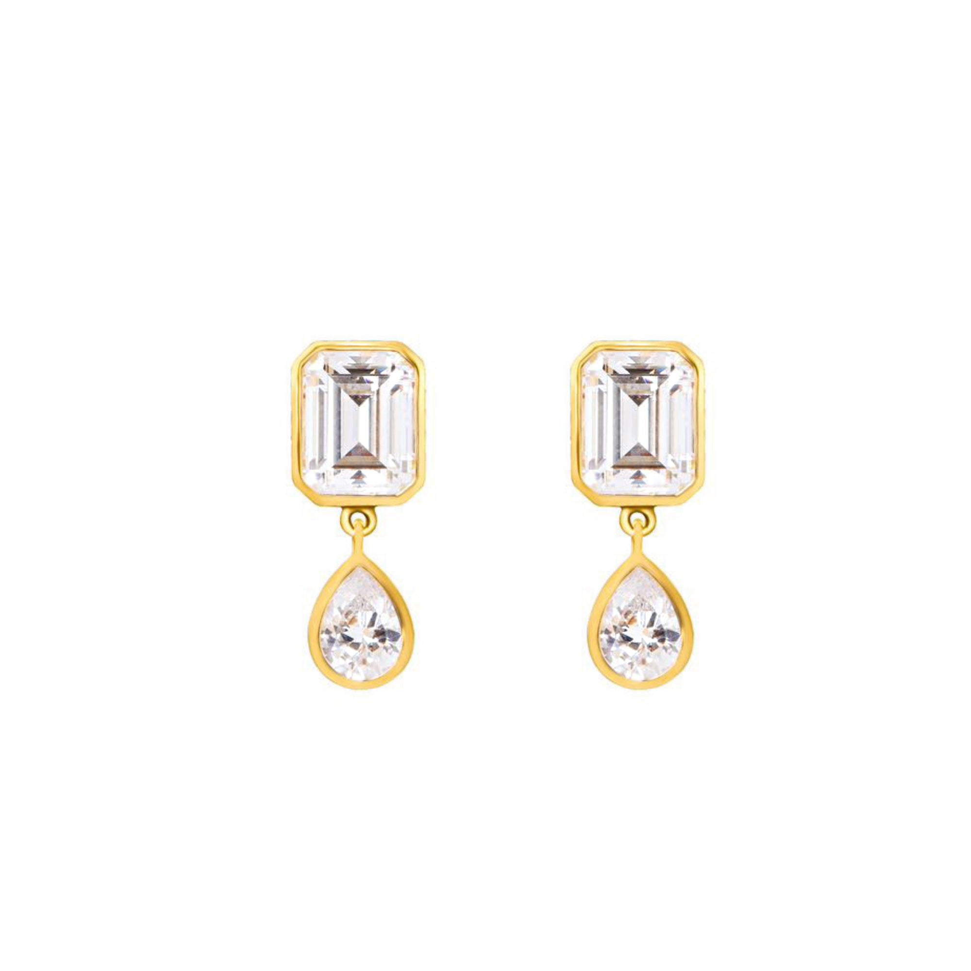 Gold earrings with emerald-cut and teardrop-shaped topaz on a white background