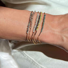 Gold Plated Silver Bracelet with Green Diamonds