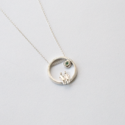 Silver Necklace with Emerald "All Around Us"