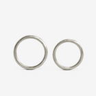 A hand-forged, 24k platinum rings with a textured surface, displayed on a white background.