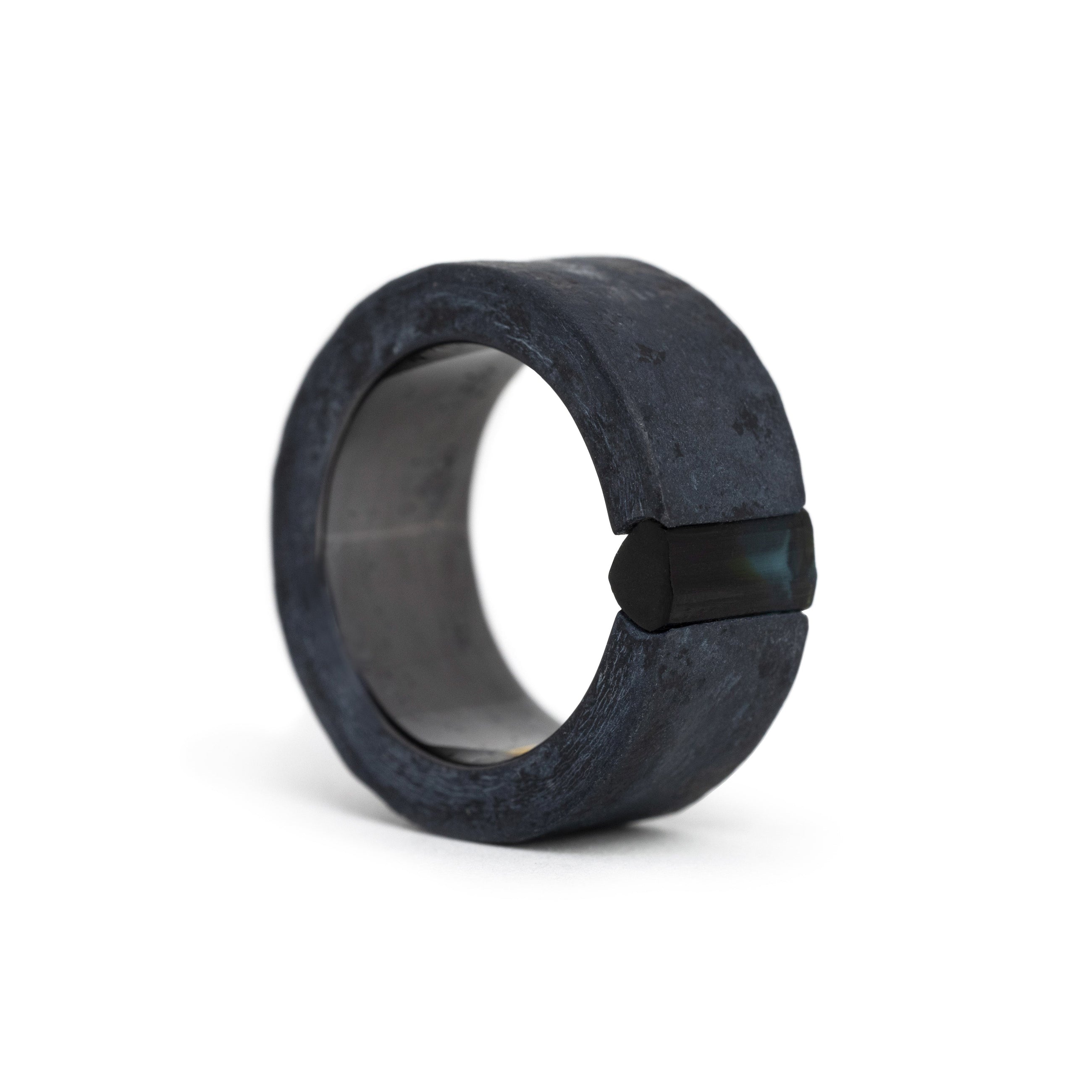 One-of-a-kind ring composed of niobium and blue tourmaline.