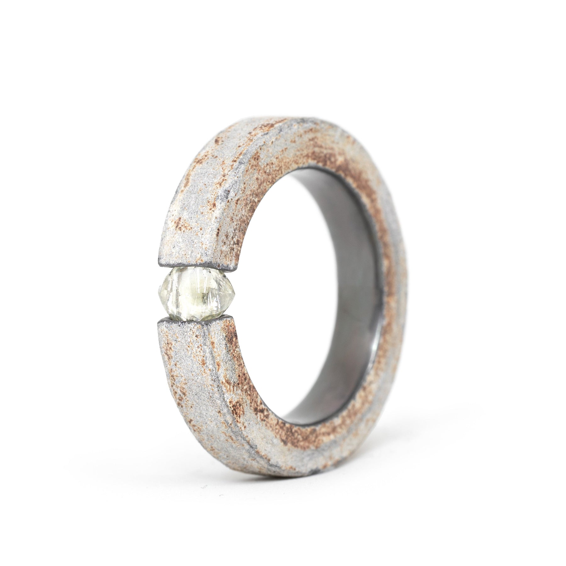 One-of-a-kind ring composed of hafnium and rough diamond by ASR JWLS.