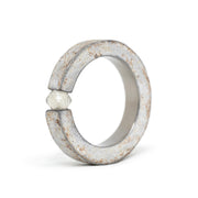 One-of-a-kind ring composed of hafnium and rough diamond by ASR JWLS.