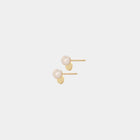 Minimal design yellow gold and freshwater pearl stud earrings by Adele Notes.