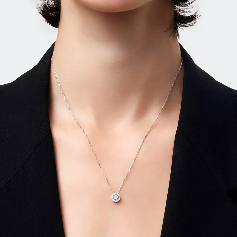 Halo Diamond Pendant featuring a central diamond surrounded by a sparkling halo, with a total carat weight of 0.40 ct.