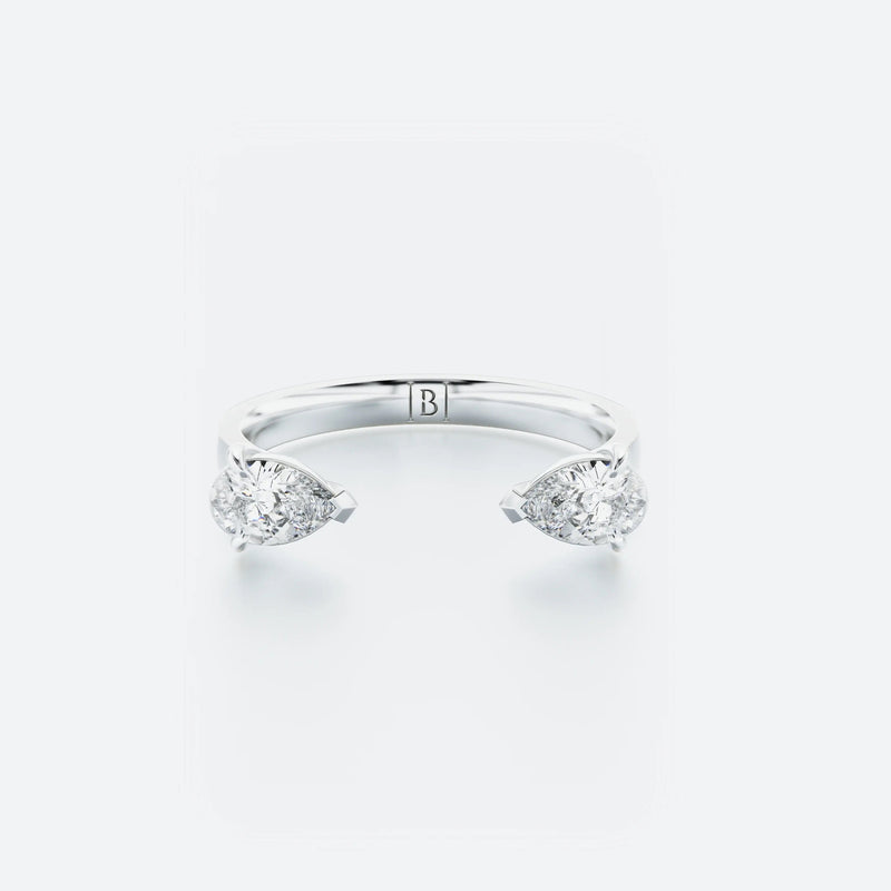 Pear-Shaped diamond hug ring featuring two pear-shaped diamonds gracefully set on an open band, with a total carat weight of 0.60 ct.