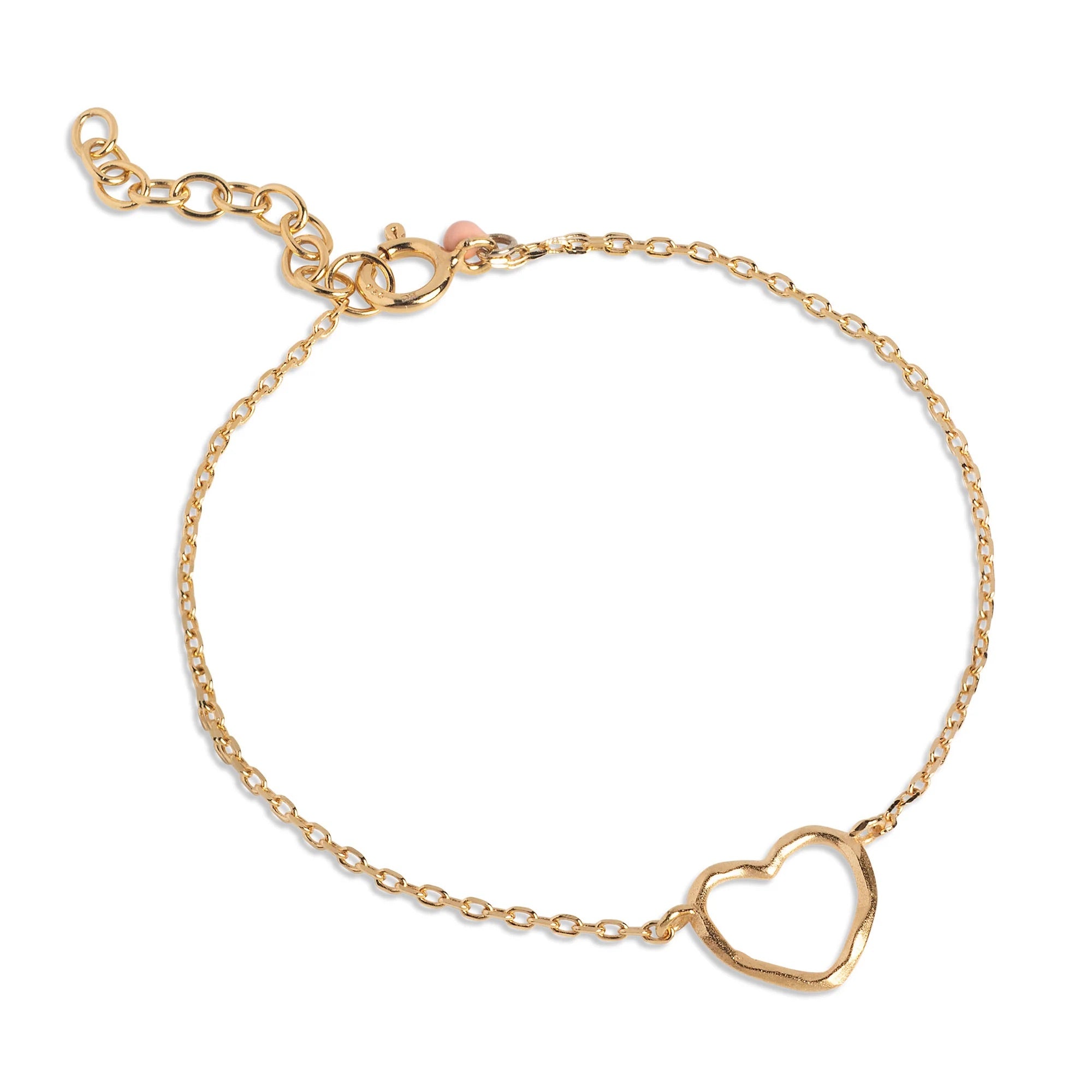 Gold bracelet with a heart-shaped pendant on a white background