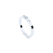 A solid white gold ring with the finest quality laboratory made diamond, featuring the inscription 'GIRL' on it.