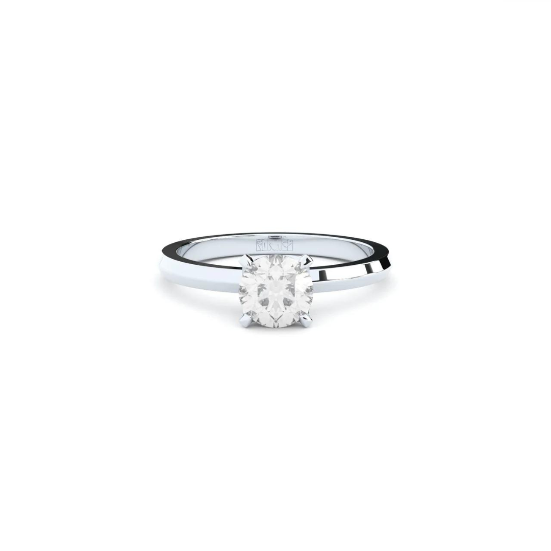 Exclusive engagement ring handcrafted in solid white gold. Set with the finest quality laboratory-made diamond in solitaire setting.