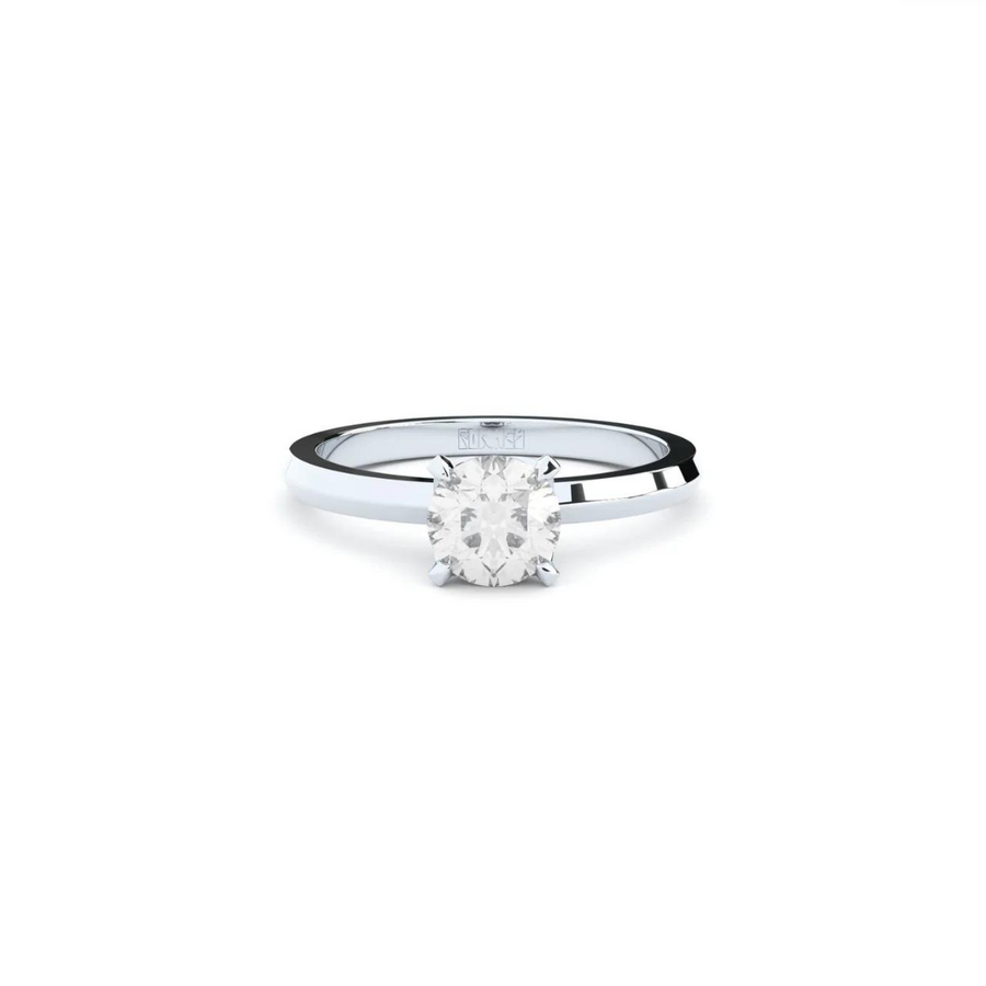 Exclusive engagement ring handcrafted in solid white gold. Set with the finest quality laboratory-made diamond in solitaire setting.