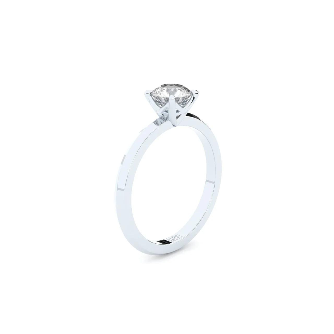 Exclusive engagement ring handcrafted in solid white gold. Set with the finest quality laboratory-made diamond in solitaire setting.