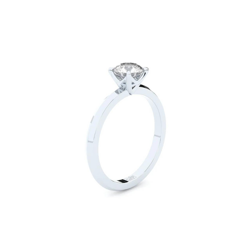 Exclusive engagement ring handcrafted in solid white gold. Set with the finest quality laboratory-made diamond in solitaire setting.
