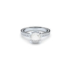 White gold luxurious engagement ring with 2.00 ct central diamond. 