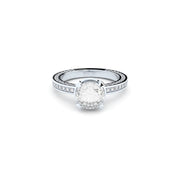 White gold luxurious engagement ring with 2.00 ct central diamond. 