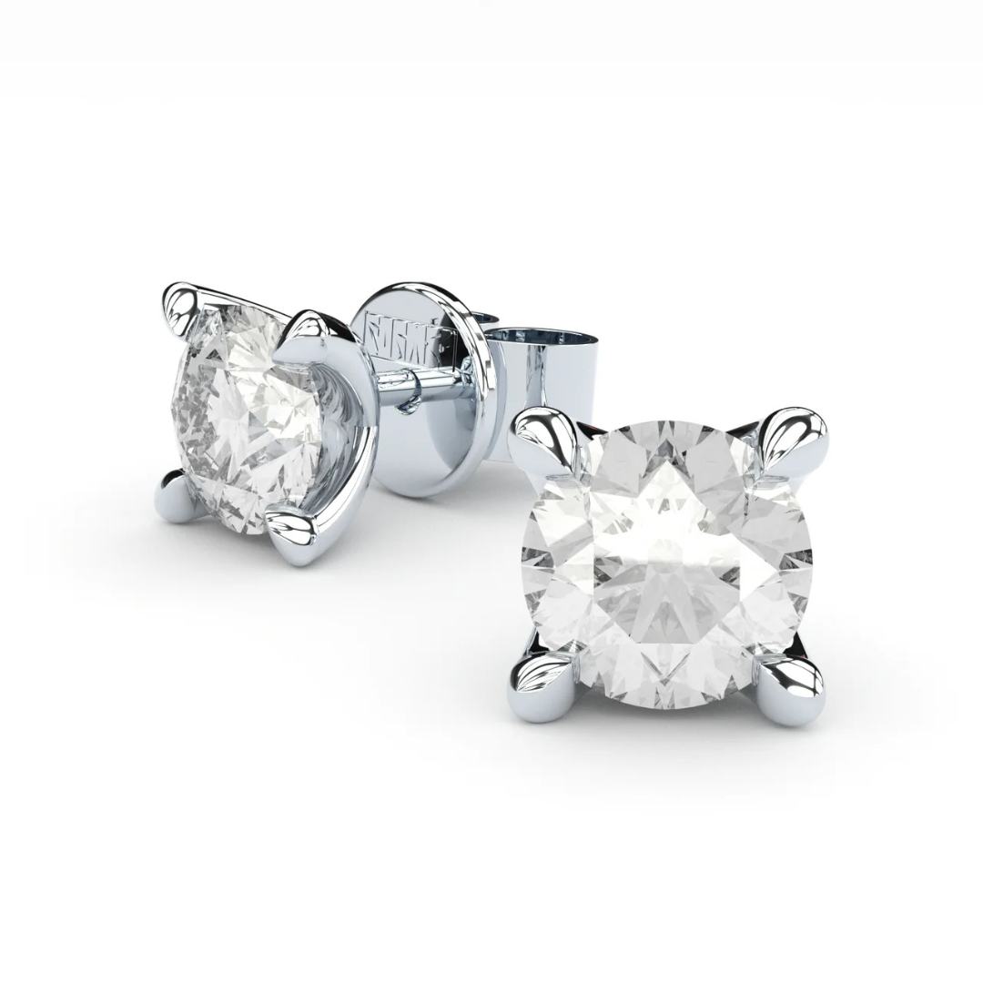 Luxurious stud earrings made in solid recycled white gold. Set with the finest quality laboratory made diamonds.