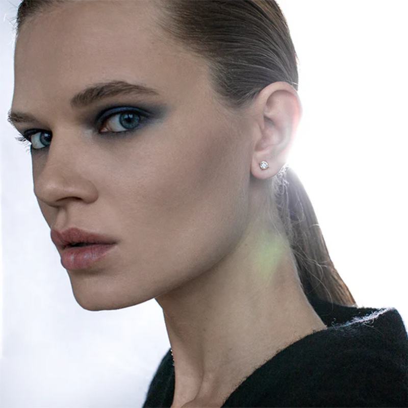 Luxurious stud earrings made in solid recycled white gold. Set with the finest quality laboratory made diamonds.