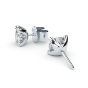 Luxurious stud earrings made in solid recycled white gold. Set with the finest quality laboratory made diamonds.