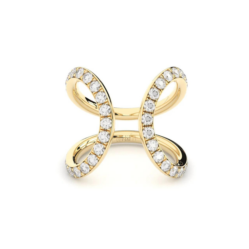 A yellow gold ring and ear cuff featuring a series of lab grown diamonds set in recycled 18k yellow gold, with a total of 86 diamonds.