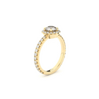 Yellow gold engagement ring set with a finest-quality, laboratory-made 0.50 ct center diamond, surrounded by smaller diamonds in a halo-style setting.