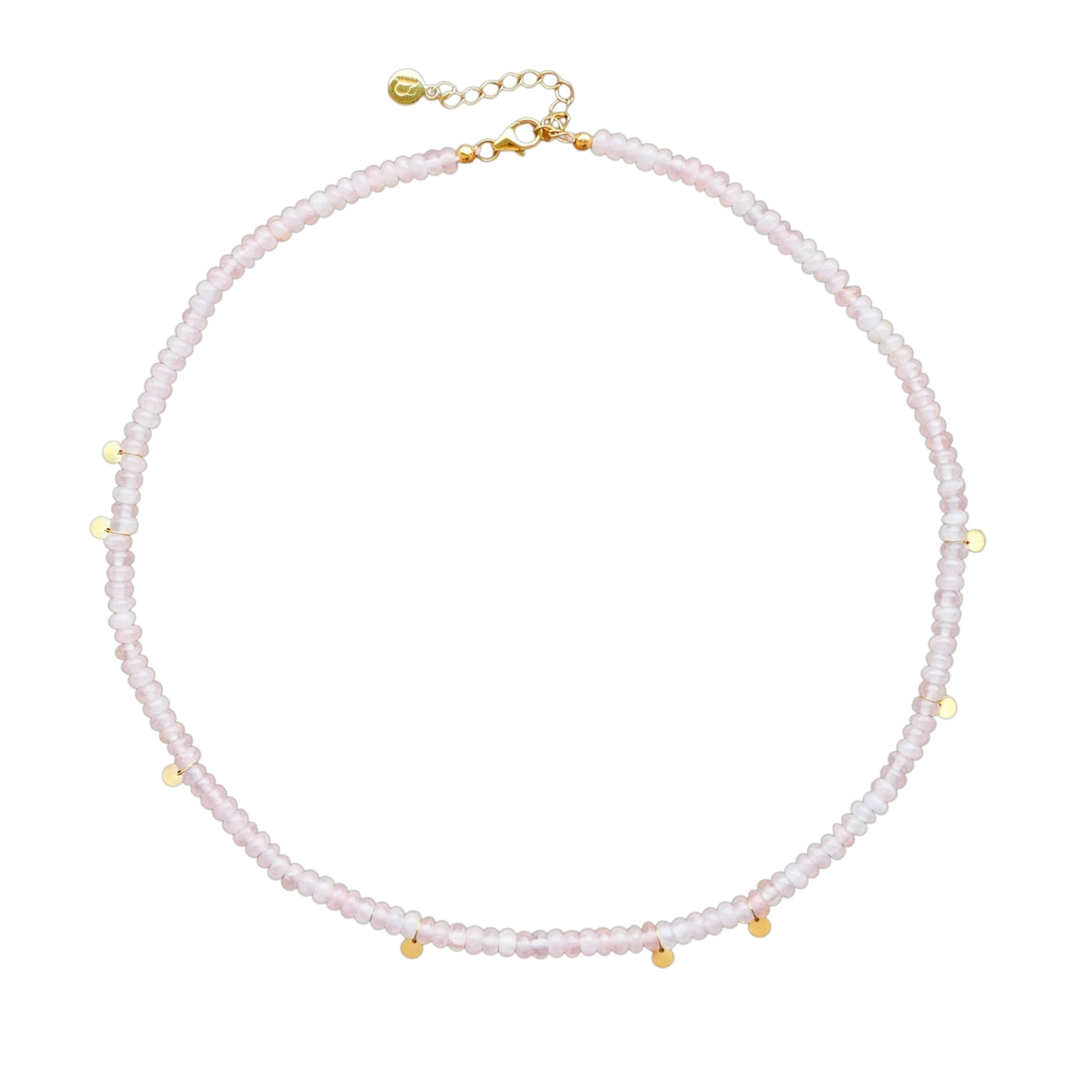 A delicate beaded necklace in pale pink quartz with small gold-plated silver accents and a gold-plated chain extender clasp, shown on a plain white background.