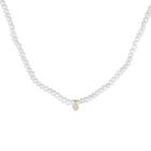 A white freshwater pearl necklace with a small gold pendant featuring a clear round-cut topaz gemstone, displayed against a solid white background.