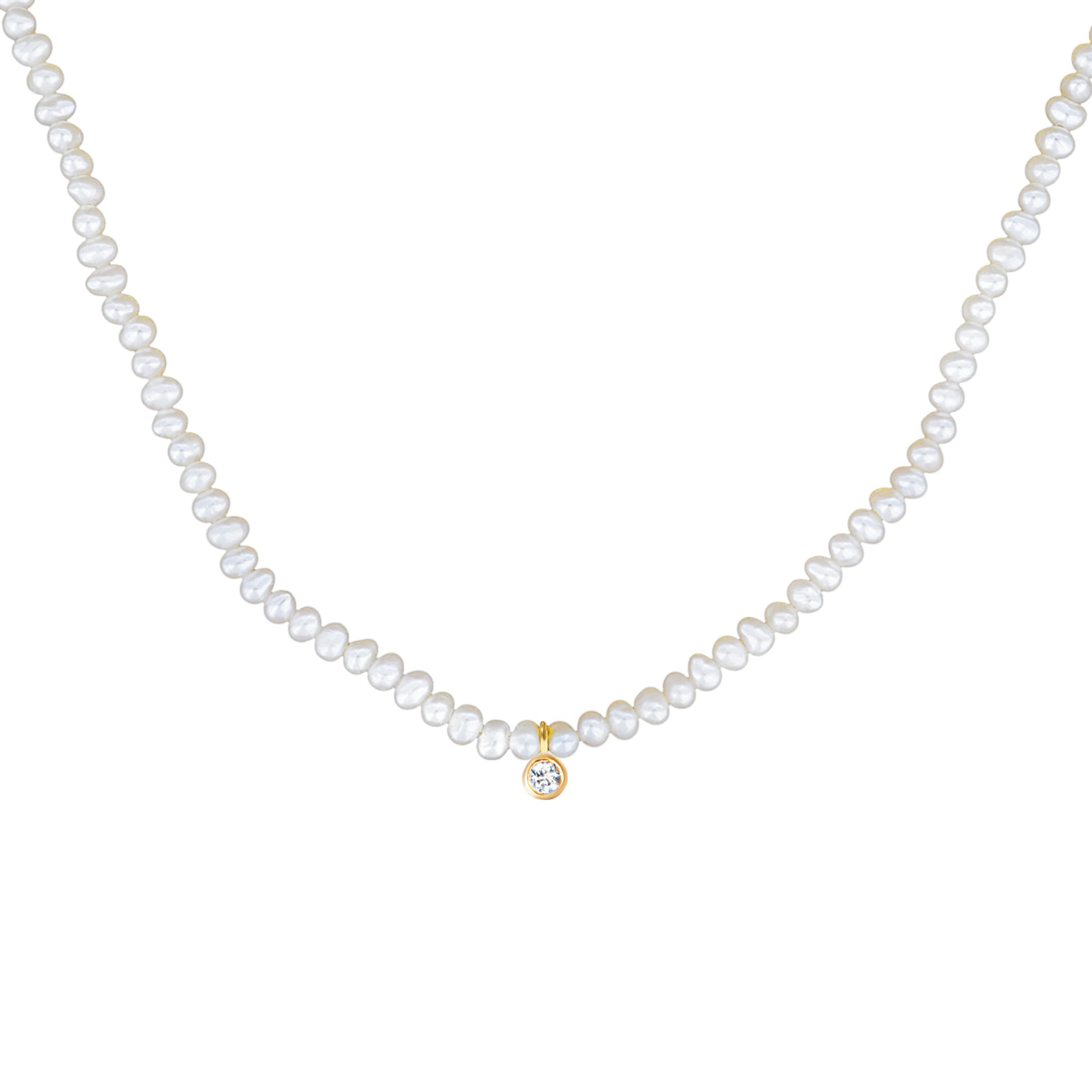A white freshwater pearl necklace with a small gold pendant featuring a clear round-cut topaz gemstone, displayed against a solid white background.