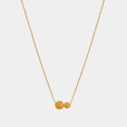 Gold necklace with two asymmetrical Baltic amber pendants by Adele Notes. 