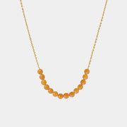 Necklace with Baltic amber beads on a white background