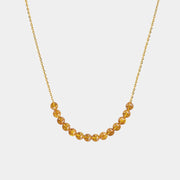 Necklace with Baltic amber beads on a white background