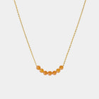 Necklace with Baltic amber beads on a white background