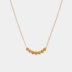 Necklace with Baltic amber beads on a white background