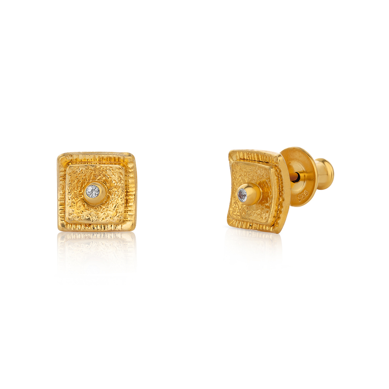 Gold square earrings with diamonds on a white background