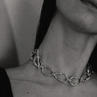 Gold-plated bronze necklace featuring an organic chain of irregular, textured links with a molten-inspired finish.