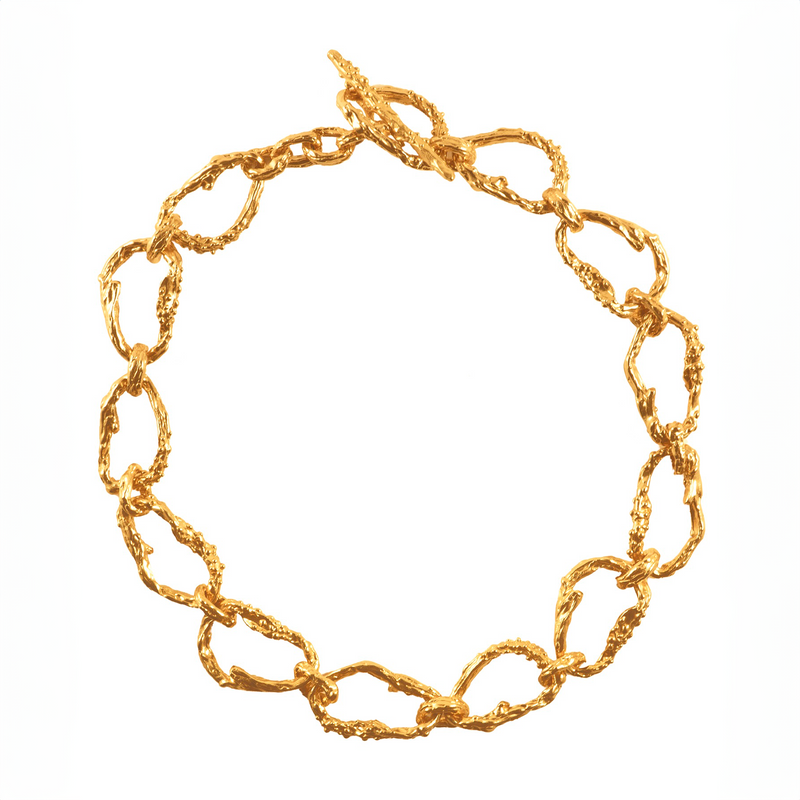 Gold-plated bronze necklace featuring an organic chain of irregular, textured links with a molten-inspired finish.