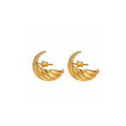 A pair of gold-plated silver textured, twisted silver hoop earrings, shown against a plain white background.