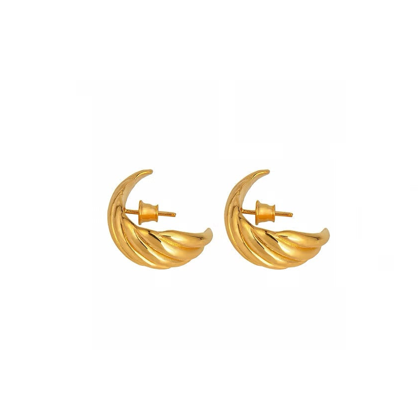 A pair of gold-plated silver textured, twisted silver hoop earrings, shown against a plain white background.
