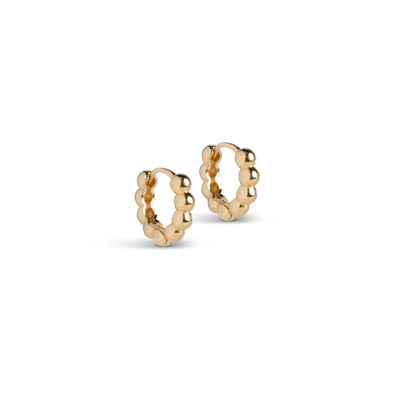 A pair of small gold-plated silver hoop earrings with a textured ball design.