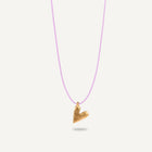 A gold plated silver necklace with a heart-shaped pendant on a purple string.