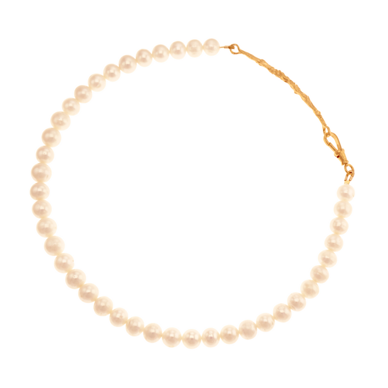 A gold-plated silver necklace featuring a string of Akoya pearls.