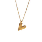 Gold heart-shaped pendant necklace on a white background