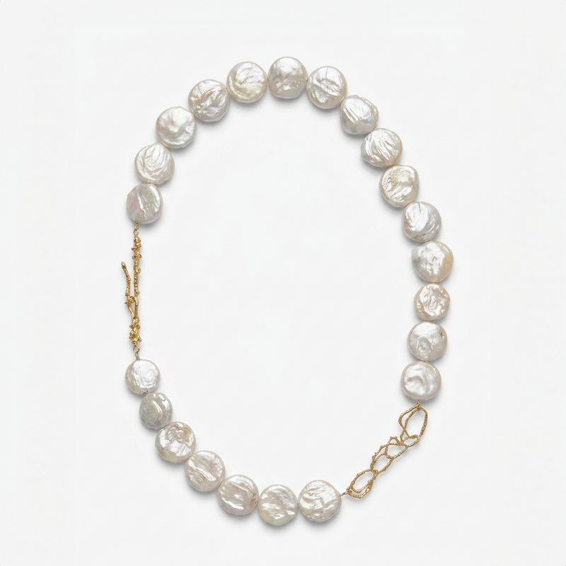 Gold-plated silver necklace composed of natural baroque pearls 