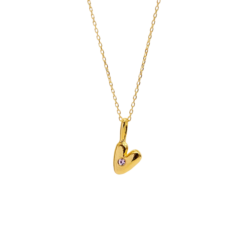 Gold heart-shaped necklace with a small purple gem on a white background