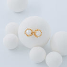 Gold-plated silver earrings with Akoya pearls.
