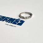 Custom-made gold rings featuring a bespoke name by Formes.