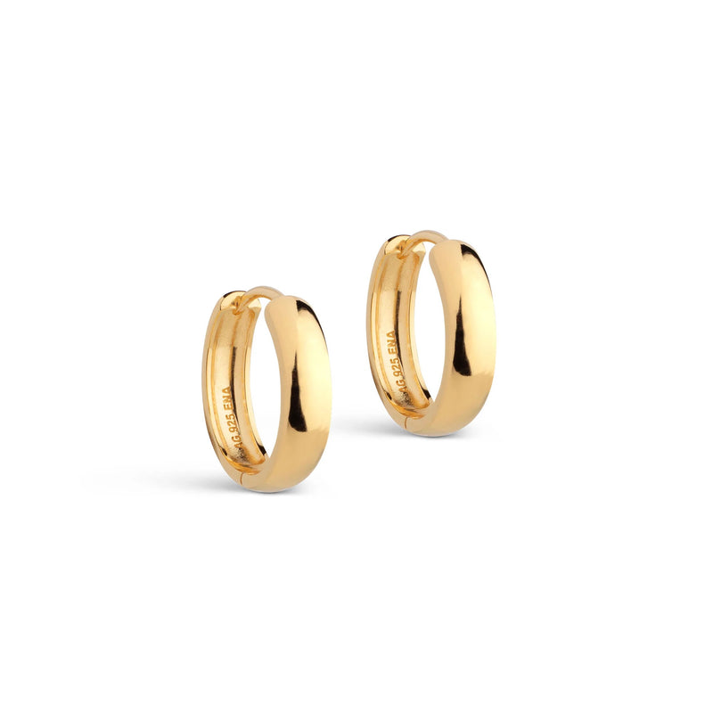 Gold hoop earrings on a white background